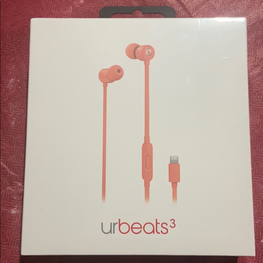 wired headphones, coral